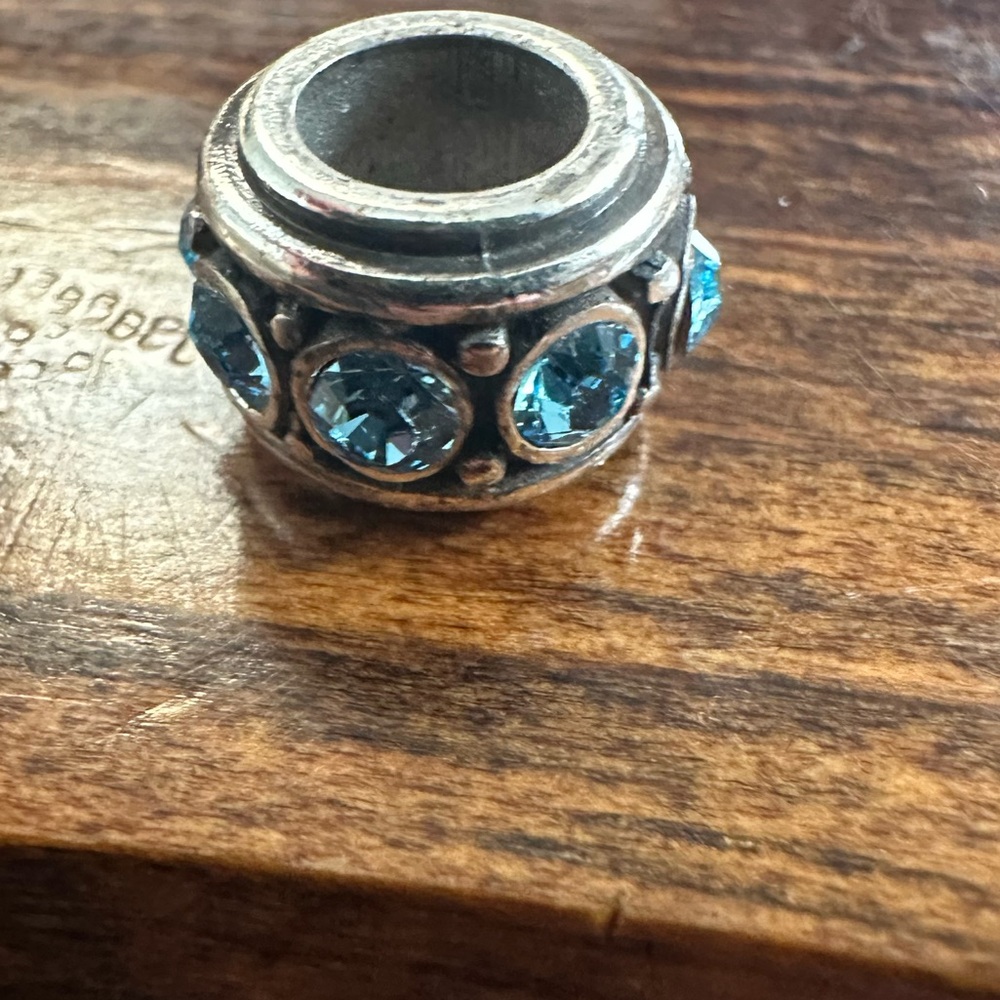 Elegant Silver charm with Blue Accents